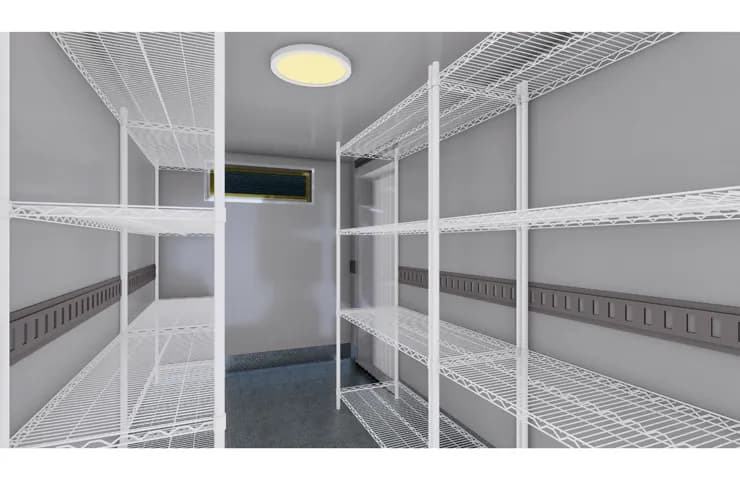 Chrome wire shelving units inside the 7x14 refrigerated trailer