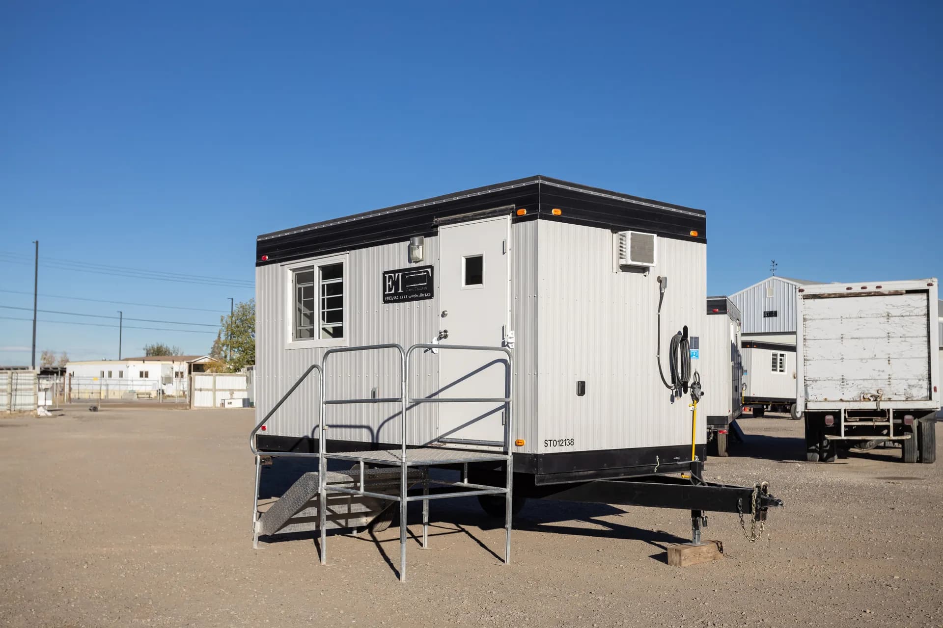 Real 8x16 Wheeled Office Trailer on Job Site