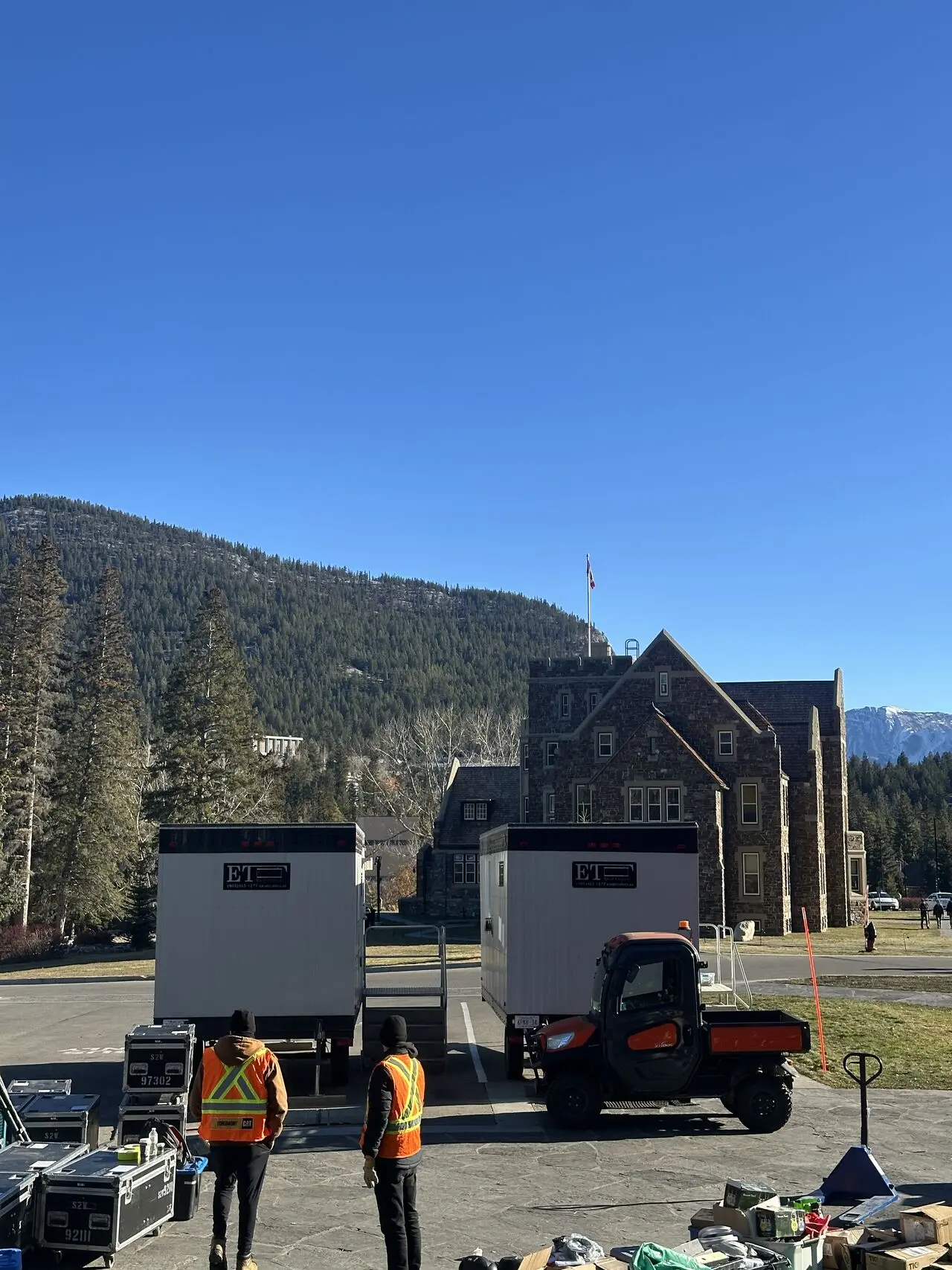 Excel Trailers office unit stationed against a mountain backdrop in Banff Alberta