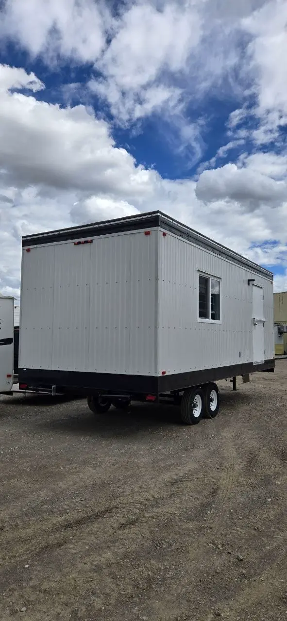Rear three-quarter view of a finished office trailer built by Excel Trailers